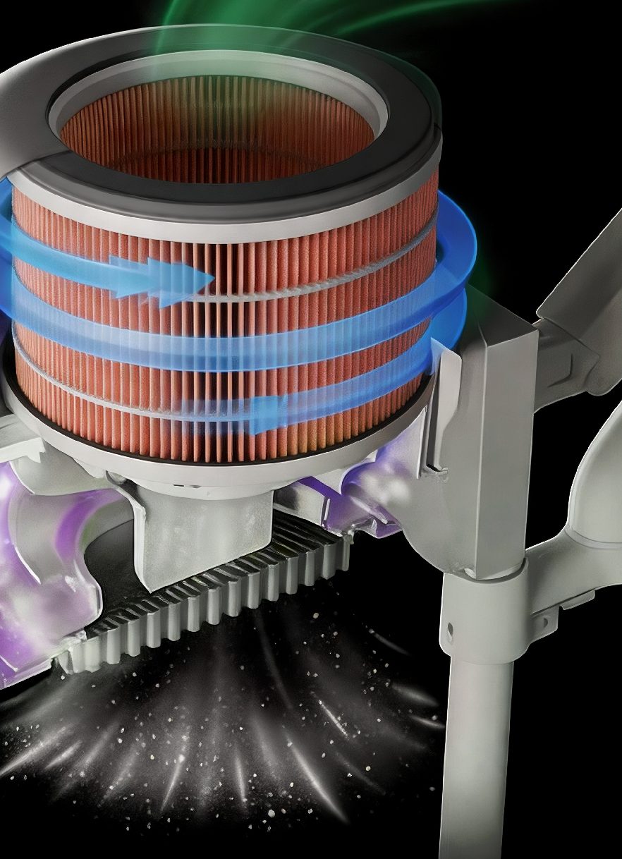 Cutaway of an arm-mounted hood dust collector with a PureFibe ring filter, showing air drawn around the pleats